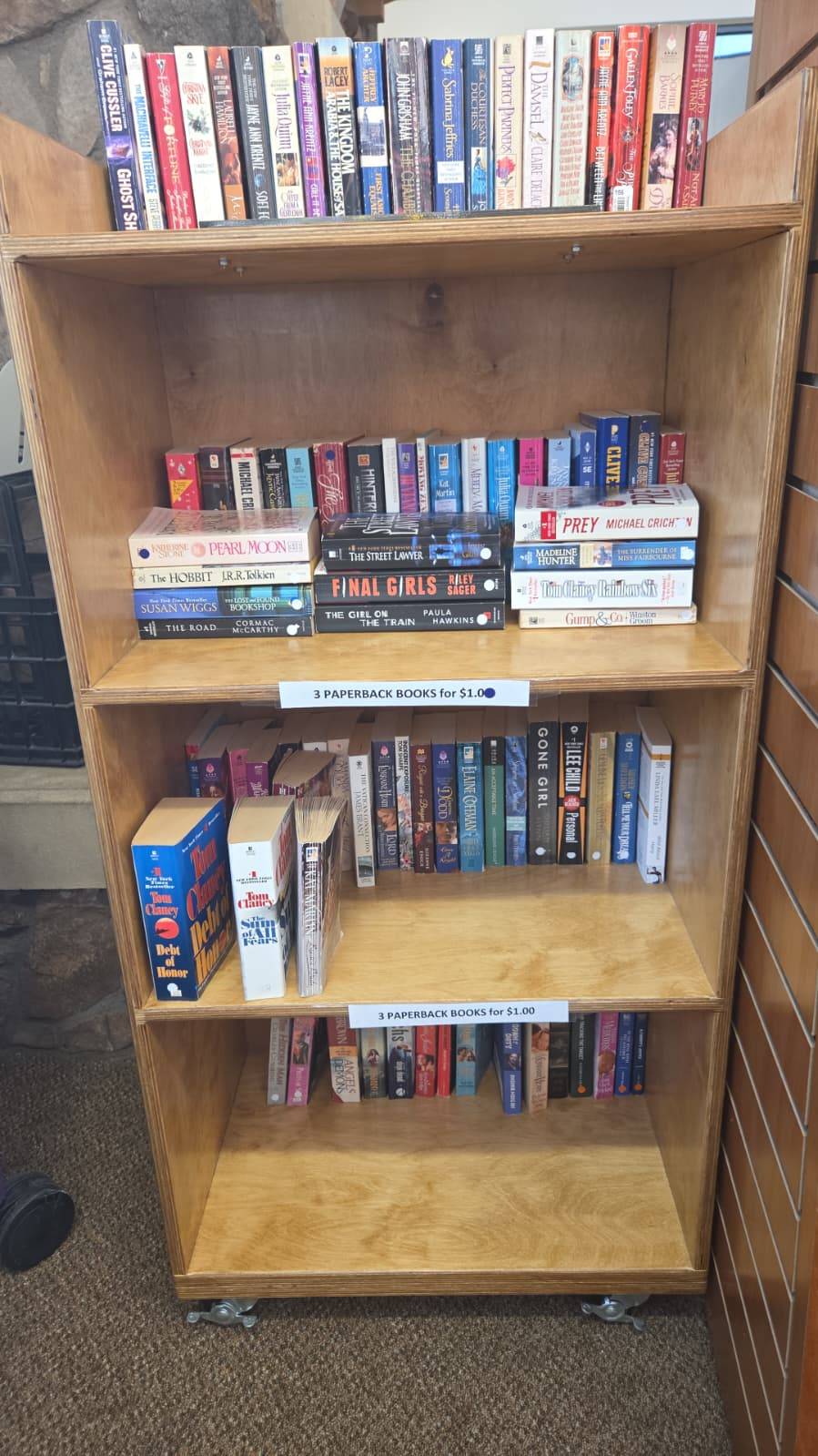Finished wooden rolling bookshelf installed at the library