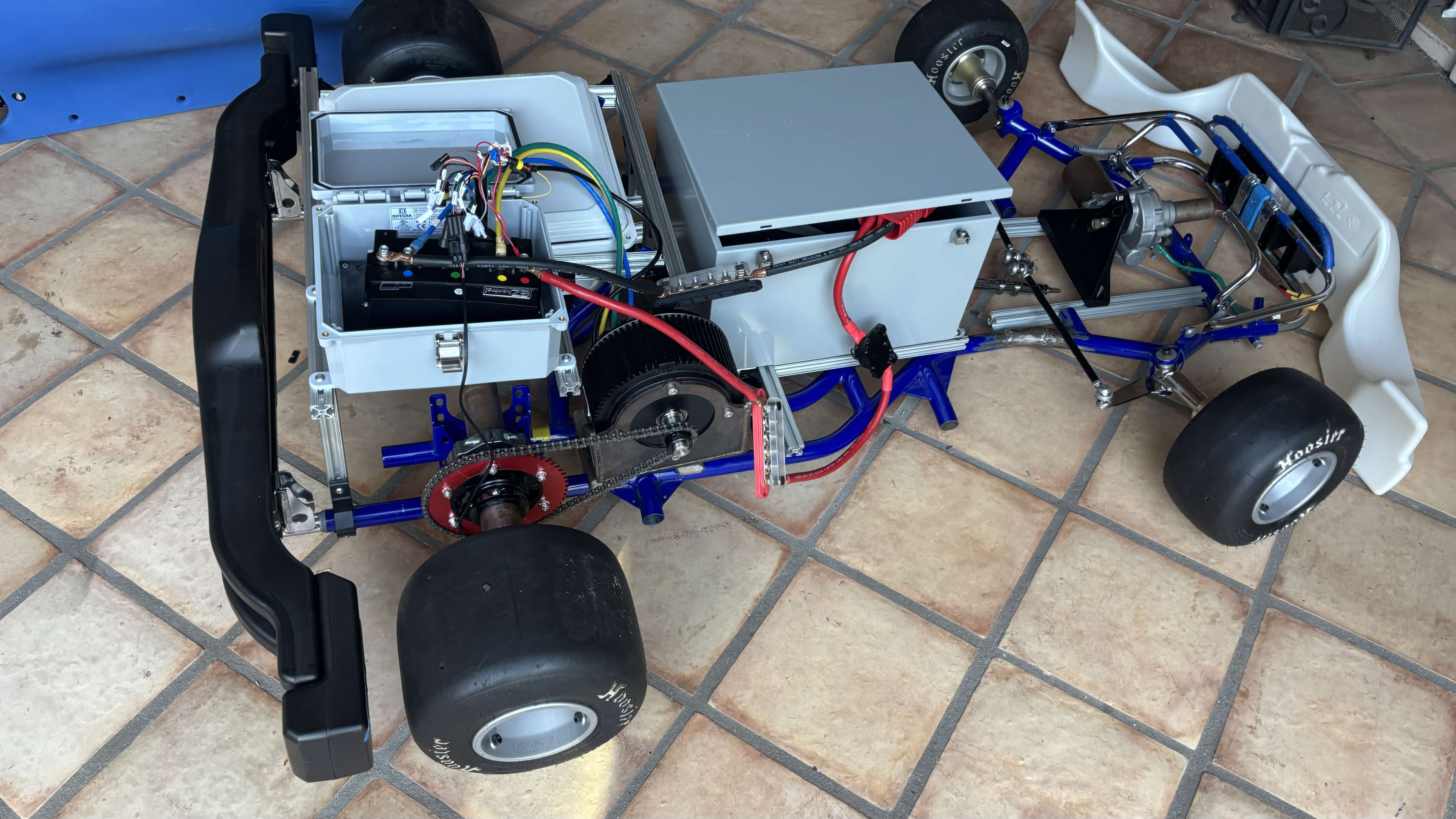 Student autonomous kart chassis with electronics and wiring installed